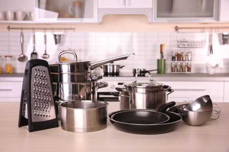 Kitchenware for cooking classes on wooden tableの写真素材