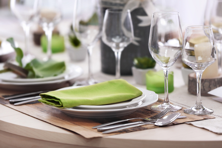 Table setting for dinner in restaurantの写真素材