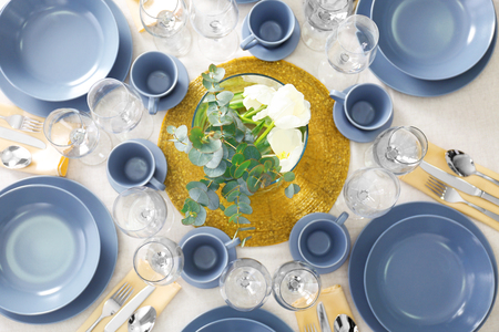 Table setting for dinner in restaurantの写真素材
