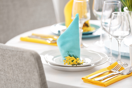 Table setting for dinner in restaurantの写真素材