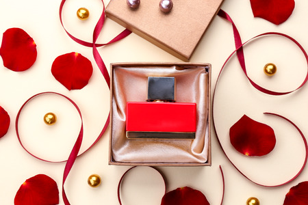 Perfume in present box on color backgroundの写真素材