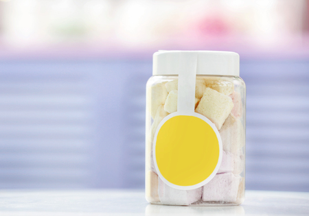 Tasty marshmallow in jar at candy shopの写真素材