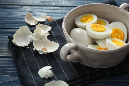 Bowl with tasty hard boiled eggs on table. Nutrition conceptの写真素材
