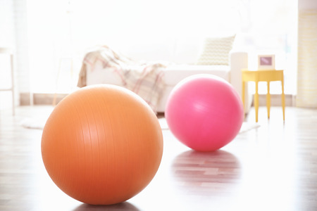 Rubber balls on floor indoorsの写真素材
