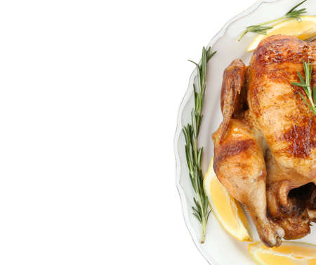 Plate with tasty homemade lemon chicken on white backgroundの写真素材