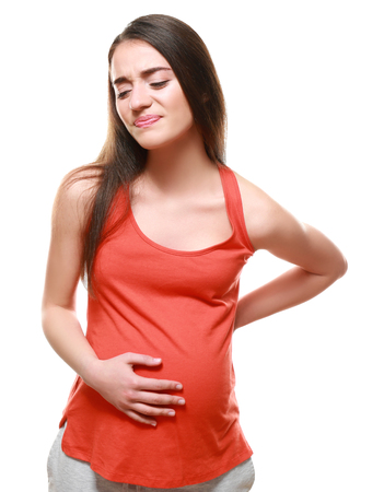 Emotional pregnant woman on white backgroundの写真素材