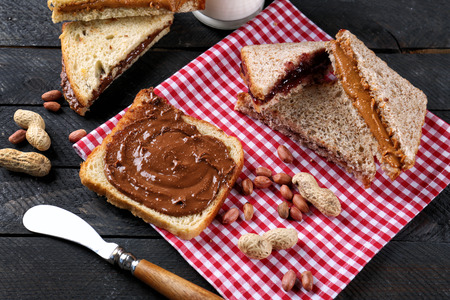 Tasty sandwiches with peanut butter on tableの写真素材