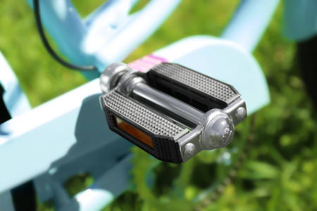 Closeup view of bicycle pedal on blurred backgroundの写真素材