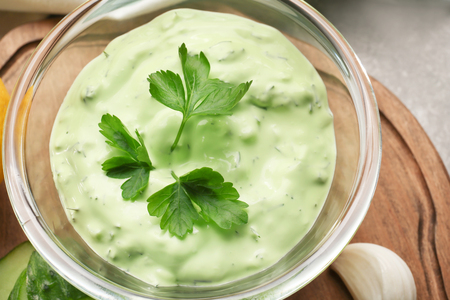 Delicious yogurt sauce in bowl, closeupの写真素材