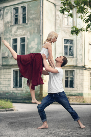 Passionate couple dancing outdoorsの写真素材