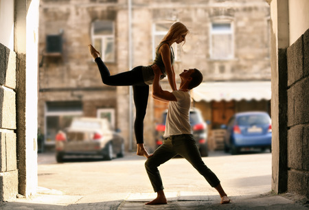 Passionate couple dancing outdoorsの写真素材