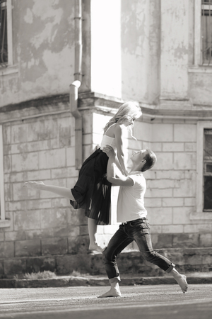 Passionate couple dancing outdoorsの写真素材