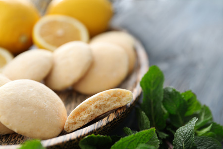 Plate with homemade lemon cookies on table, closeupの写真素材