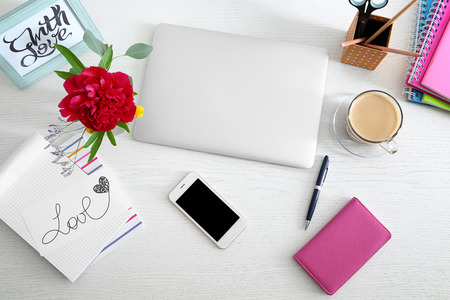 Beautiful fragrant flowers as floral decoration on workplaceの写真素材