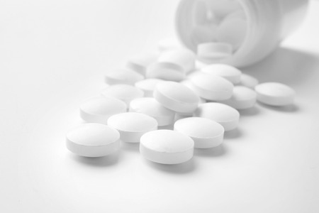 Health care concept. Pills and jar on white backgroundの写真素材