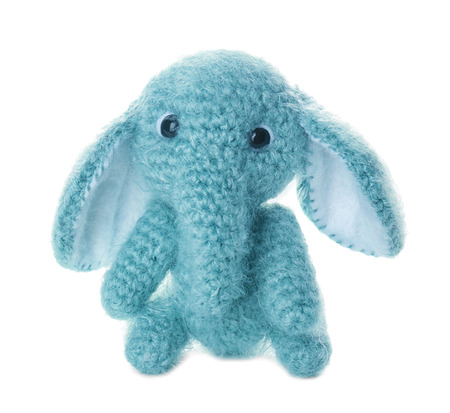 Handmade elephant toy isolated on whiteの写真素材
