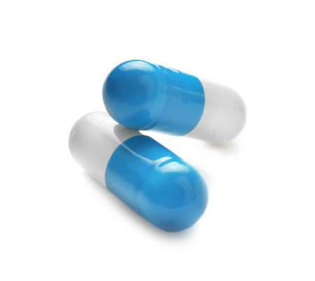 Colorful pills on white background. Health care conceptの写真素材