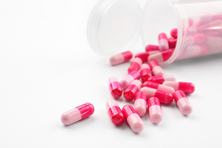 Health care concept. Pills and jar on white backgroundの写真素材