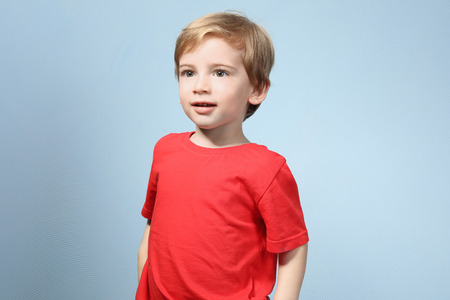 Cute little boy on color backgroundの写真素材