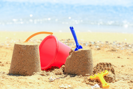Composition with colorful toys on sea shore. Vacation conceptの写真素材