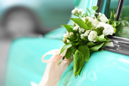 Beautiful floral decoration on wedding carの写真素材