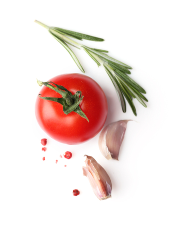 Composition with fresh rosemary and vegetables on white backgroundの写真素材