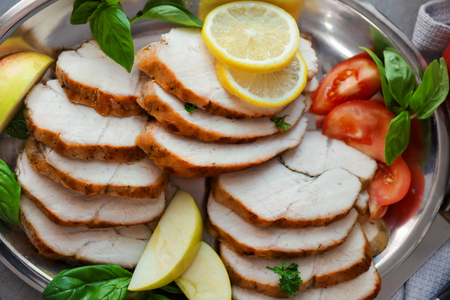Plate with delicious sliced turkey fillet, closeupの写真素材