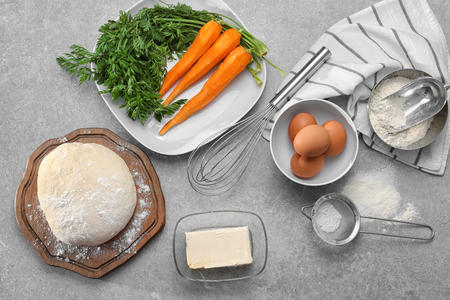 Ingredients for baking carrot cake on tableの写真素材