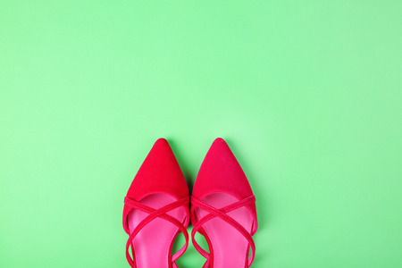 Stylish flat shoes on color backgroundの写真素材