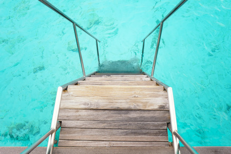 Wooden stair at sea resort in summer dayの写真素材