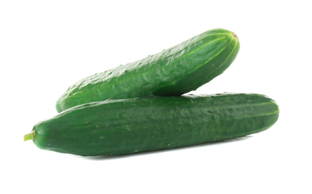 Fresh cucumbers on white backgroundの写真素材