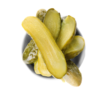 Bowl with pickled cucumbers on white backgroundの写真素材