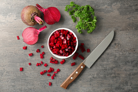 Composition with sliced beetroot on table