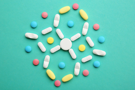 Composition with different pills on color backgroundの写真素材