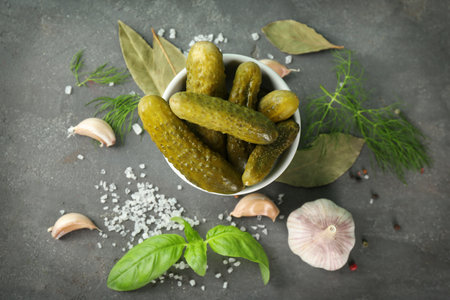 Composition with pickled cucumbers on tableの写真素材