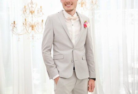 Handsome groom on wedding day, indoorsの写真素材
