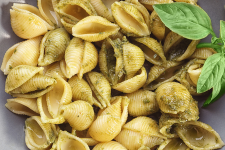 Plate of delicious pasta with pesto sauce, closeupの写真素材