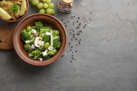 Dish with broccoli salad on tableの写真素材