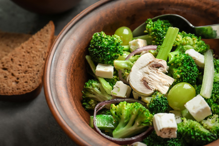 Dish with broccoli salad on tableの写真素材