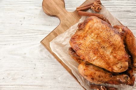 Roasted turkey on wooden boardの写真素材