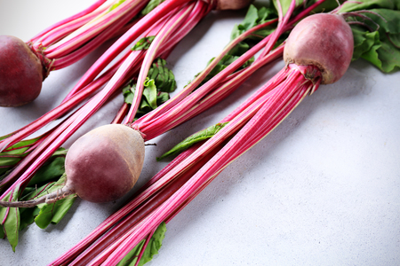 Fresh young beets on light backgroundの写真素材