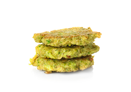 Broccoli pancakes isolated on whiteの写真素材