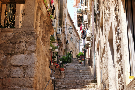 View of picturesque street with old stone stepsの写真素材