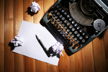 Antique Typewriter. Vintage Typewriter Machine on wooden tableの写真素材