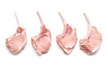 Composition with raw ribs isolated on white background