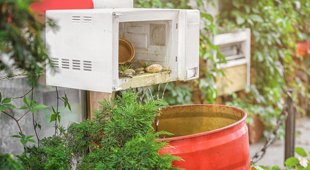 Artificial waterfall made of microwave outdoors. Recycling conceptの写真素材
