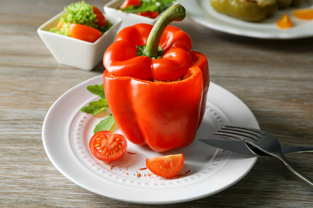 Quinoa stuffed pepper on white plateの写真素材