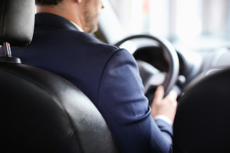 Handsome male driver in carの写真素材