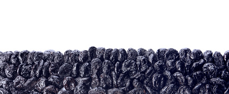 Tasty dried plums on white backgroundの写真素材