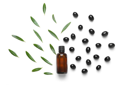 Composition with olive oil on white background